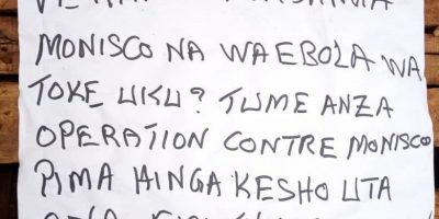 A sign posted in Beni on November 25 in response to the UN and Ebola responders. Translation: MONUSCO and Ebola staff should leave this place. We have started an operation against MONUSCO, tomorrow you will see [the bandits we are]. Reproduced with permission.