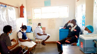 Nurses sitting with masks on