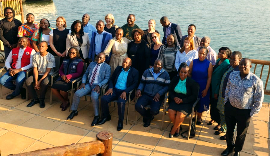 Photo de groupe lors d'un événement d'apprentissage à Livingstone, en Zambie. Août 2024.
